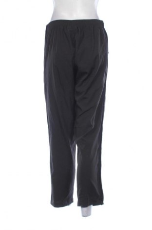Damskie spodnie sportowe Manguun, Rozmiar M, Kolor Czarny, Cena 38,99 zł