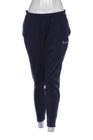 Damskie spodnie sportowe Nike, Rozmiar L, Kolor Niebieski, Cena 134,99 zł