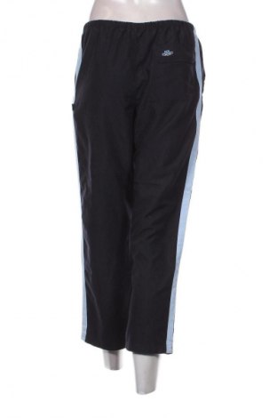 Damskie spodnie sportowe TCM, Rozmiar M, Kolor Niebieski, Cena 95,99 zł