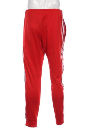 Pantaloni trening de bărbați Adidas Originals, Mărime M, Culoare Roșu, Preț 156,99 Lei