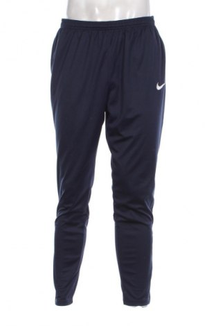 Męskie spodnie sportowe Nike, Rozmiar XL, Kolor Niebieski, Cena 157,99 zł