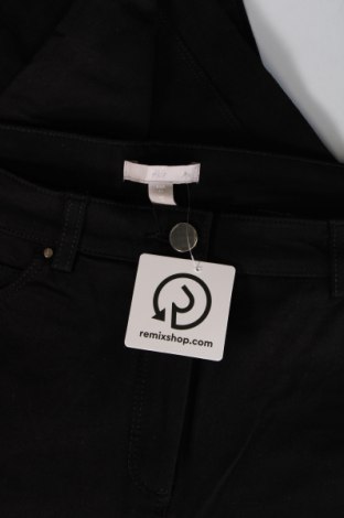 Damskie jeansy H&M, Rozmiar L, Kolor Czarny, Cena 26,90 zł