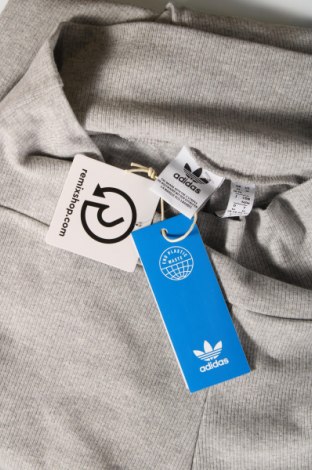 Damskie spodnie sportowe Adidas Originals, Rozmiar M, Kolor Szary, Cena 99,16 zł
