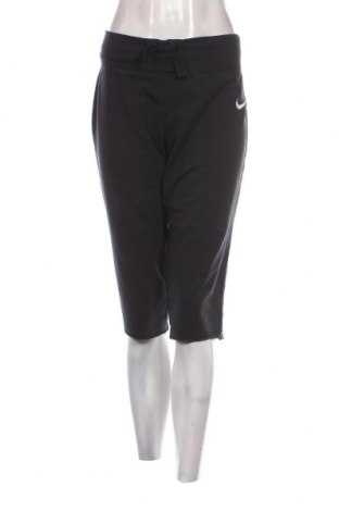Γυναικείο αθλητικό παντελόνι Nike, Μέγεθος L, Χρώμα Γκρί, Τιμή 14,28 €