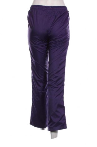 Γυναικείο αθλητικό παντελόνι PUMA, Μέγεθος S, Χρώμα Βιολετί, Τιμή 34,72 €