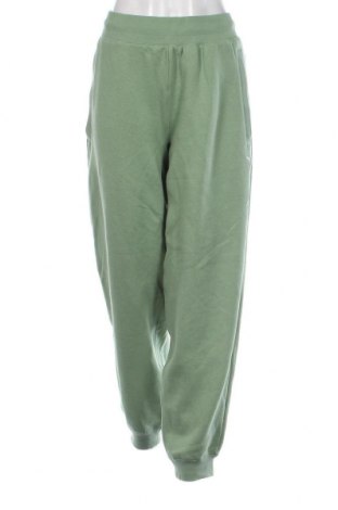 Γυναικείο αθλητικό παντελόνι PUMA, Μέγεθος L, Χρώμα Πράσινο, Τιμή 24,09 €