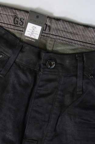 Męskie jeansy G-Star Raw, Rozmiar S, Kolor Niebieski, Cena 141,38 zł