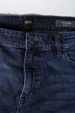 Pánske džínsy  Hugo Boss, Veľkosť XL, Farba Modrá, Cena  55,62 €