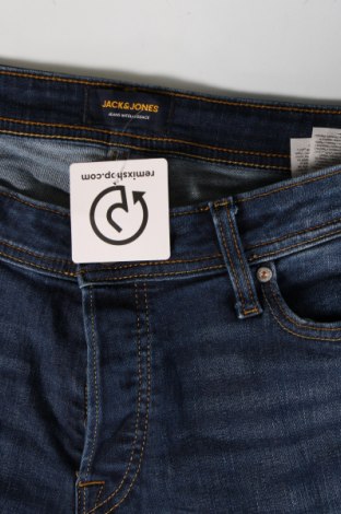 Męskie jeansy Jack & Jones, Rozmiar M, Kolor Niebieski, Cena 38,03 zł