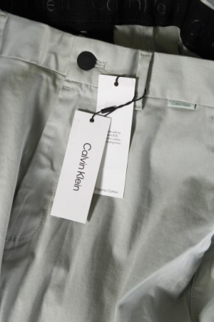 Pánske nohavice  Calvin Klein, Veľkosť M, Farba Zelená, Cena  35,46 €