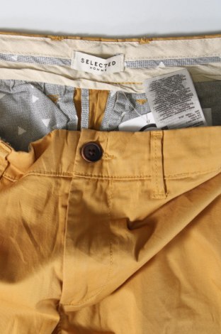 Męskie spodnie Selected Homme, Rozmiar S, Kolor Żółty, Cena 61,41 zł