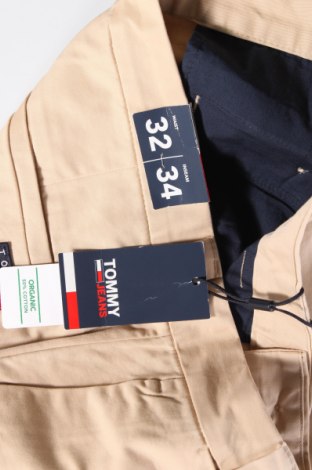 Pánské kalhoty  Tommy Jeans, Velikost M, Barva Béžová, Cena  769,00 Kč