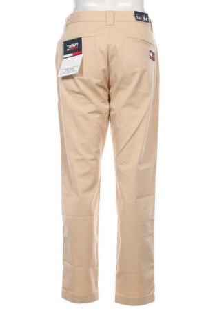 Pantaloni de bărbați Tommy Jeans, Mărime M, Culoare Bej, Preț 268,42 Lei