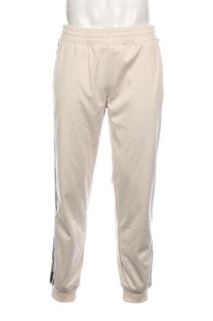 Pantaloni trening de bărbați Guess, Mărime L, Culoare Bej, Preț 391,45 Lei