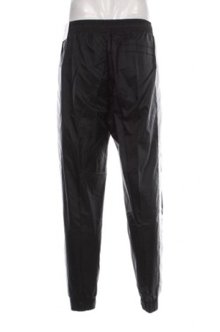 Ανδρικό αθλητικό παντελόνι Nike, Μέγεθος M, Χρώμα Μαύρο, Τιμή 47,94 €