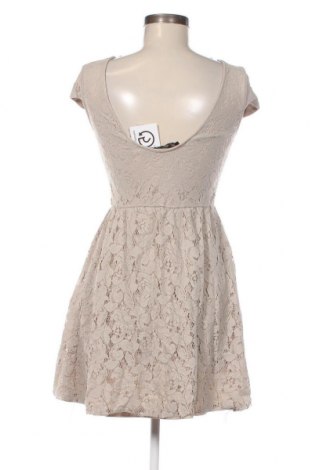 Kleid Zara Trafaluc, Größe L, Farbe Beige, Preis 8,87 €