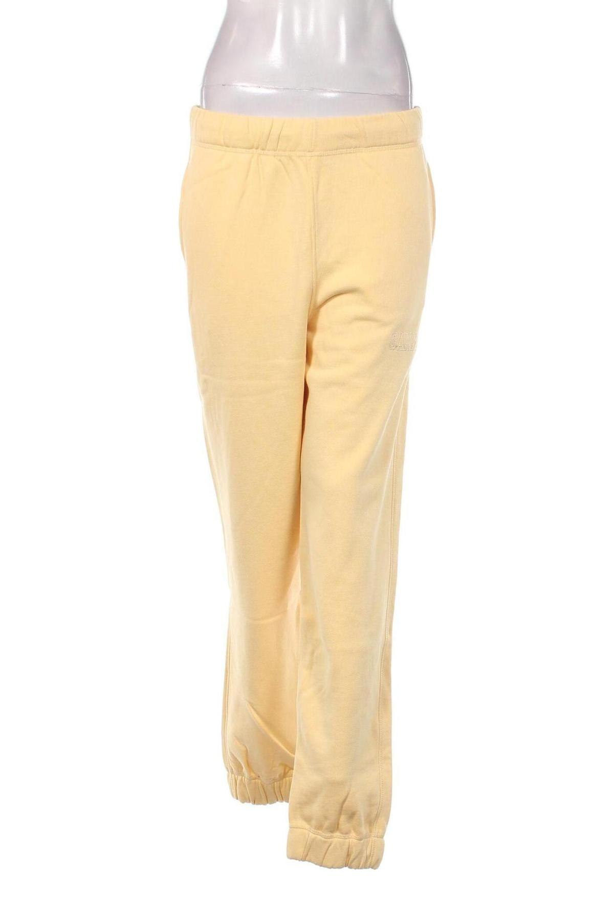 Γυναικείο αθλητικό παντελόνι Ganni, Μέγεθος S, Χρώμα Κίτρινο, Τιμή 29,77 €