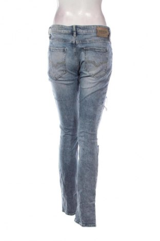 Damskie jeansy Guess, Rozmiar L, Kolor Niebieski, Cena 174,99 zł