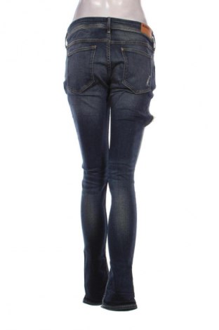 Damskie jeansy H&M, Rozmiar L, Kolor Niebieski, Cena 38,99 zł