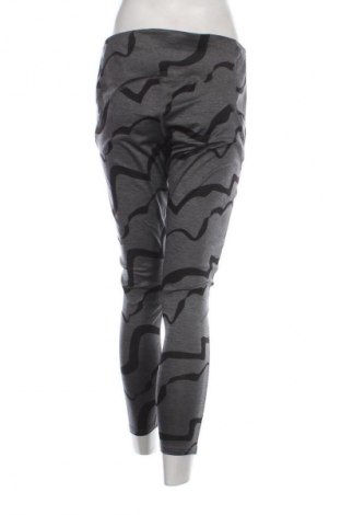 Damskie legginsy Crane, Rozmiar XL, Kolor Kolorowy, Cena 34,99 zł