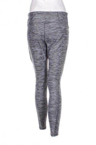 Damskie legginsy H&M Sport, Rozmiar L, Kolor Kolorowy, Cena 54,99 zł