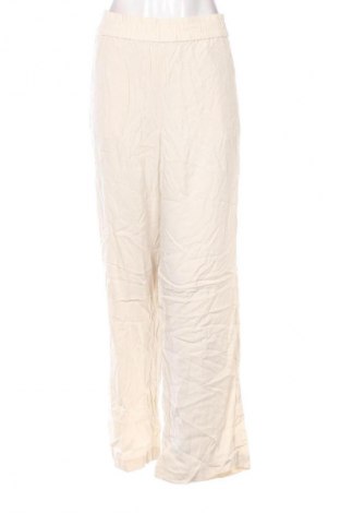 Dámské kalhoty  H&M, Velikost L, Barva Krémová, Cena  259,00 Kč