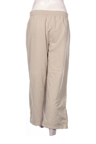 Damskie spodnie TCM, Rozmiar L, Kolor Beżowy, Cena 38,99 zł