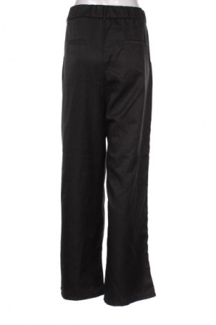 Damskie spodnie Unbranded, Rozmiar L, Kolor Czarny, Cena 112,75 zł