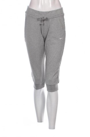 Damskie spodnie sportowe Nike, Rozmiar M, Kolor Szary, Cena 86,99 zł
