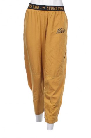 Pantaloni trening de femei Nike, Mărime L, Culoare Portocaliu, Preț 267,53 Lei