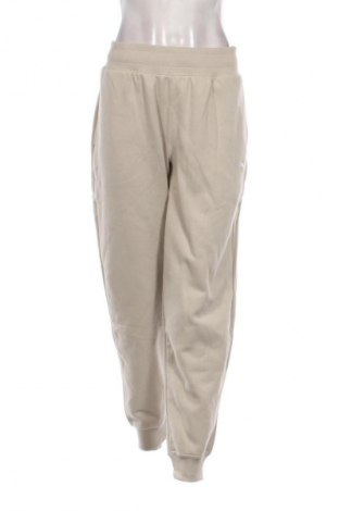 Női sport nadrág PUMA, Méret L, Szín Bézs, Ár 11 099 Ft