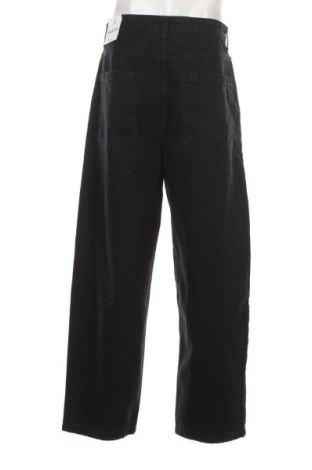 Męskie jeansy Bershka, Rozmiar L, Kolor Czarny, Cena 203,99 zł