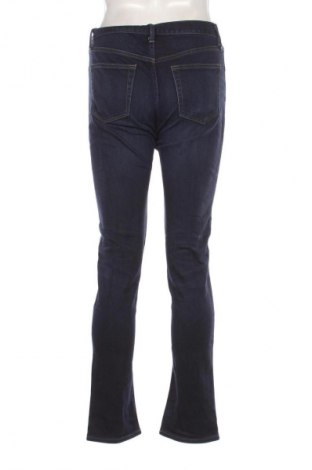 Męskie jeansy Uniqlo, Rozmiar M, Kolor Niebieski, Cena 157,99 zł