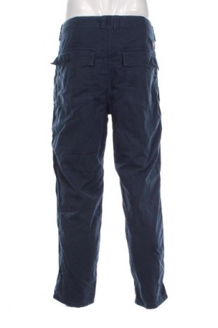 Męskie spodnie Tommy Jeans, Rozmiar L, Kolor Niebieski, Cena 481,99 zł