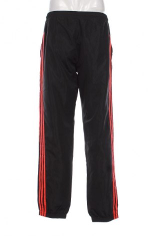 Męskie spodnie sportowe Adidas, Rozmiar M, Kolor Kolorowy, Cena 113,17 zł