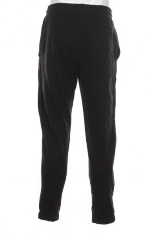 Męskie spodnie sportowe Decathlon, Rozmiar L, Kolor Czarny, Cena 81,99 zł