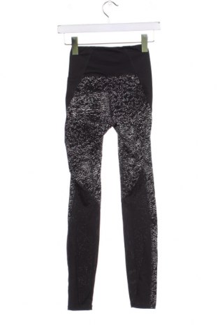 Damskie legginsy Decathlon, Rozmiar XS, Kolor Kolorowy, Cena 25,38 zł