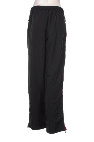 Γυναικείο αθλητικό παντελόνι Crane, Μέγεθος XL, Χρώμα Μαύρο, Τιμή 8,07 €