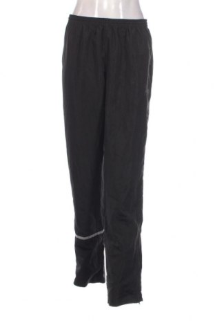 Γυναικείο αθλητικό παντελόνι New Balance, Μέγεθος M, Χρώμα Μαύρο, Τιμή 21,56 €