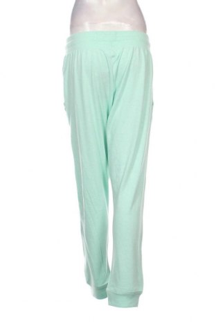 Γυναικείο αθλητικό παντελόνι Nike, Μέγεθος L, Χρώμα Πράσινο, Τιμή 47,57 €