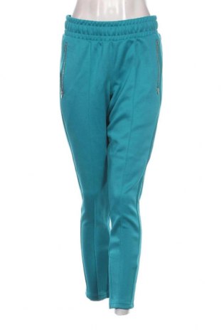 Γυναικείο αθλητικό παντελόνι PUMA, Μέγεθος M, Χρώμα Μπλέ, Τιμή 20,29 €