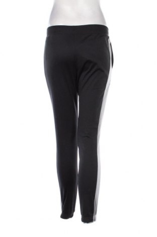 Pantaloni trening de femei Under Armour, Mărime M, Culoare Negru, Preț 114,64 Lei