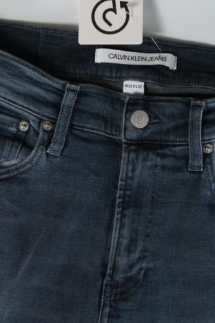 Pánske džínsy  Calvin Klein, Veľkosť L, Farba Modrá, Cena  42,53 €