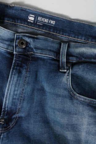 Męskie jeansy G-Star Raw, Rozmiar XL, Kolor Niebieski, Cena 543,75 zł