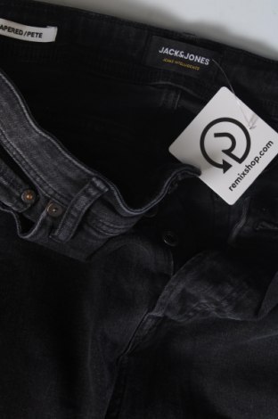 Męskie jeansy Jack & Jones, Rozmiar S, Kolor Czarny, Cena 30,71 zł