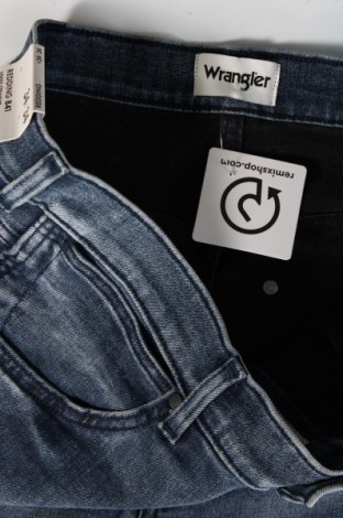 Męskie jeansy Wrangler, Rozmiar XL, Kolor Niebieski, Cena 343,85 zł