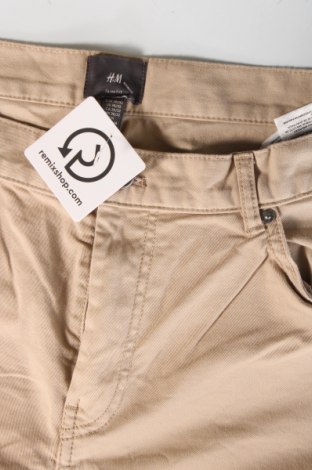 Męskie spodnie H&M, Rozmiar XL, Kolor Beżowy, Cena 41,79 zł