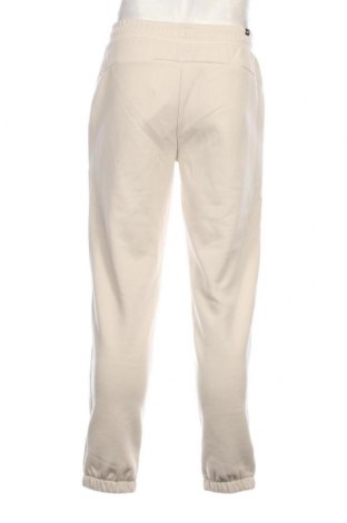 Ανδρικό αθλητικό παντελόνι PUMA, Μέγεθος M, Χρώμα  Μπέζ, Τιμή 38,35 €