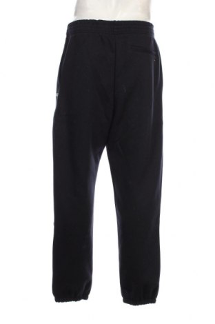 Pantaloni trening de bărbați Tommy Hilfiger, Mărime L, Culoare Albastru, Preț 288,65 Lei