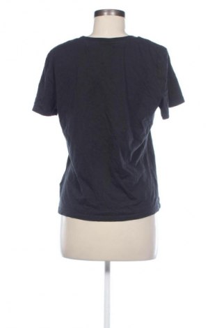 Damen T-Shirt Tommy Jeans, Größe L, Farbe Schwarz, Preis 46,65 €